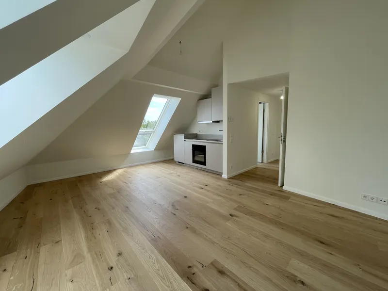 Dachgeschosswohnung mit Einbauküche und Fußbodenheizung — photo 1